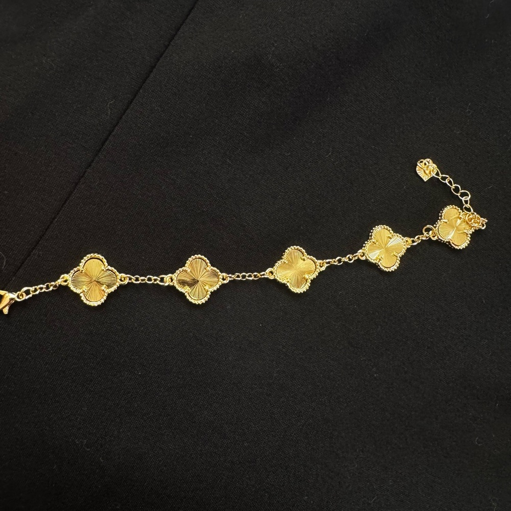 Elegant Gold Four Leaf Clover Bracelet